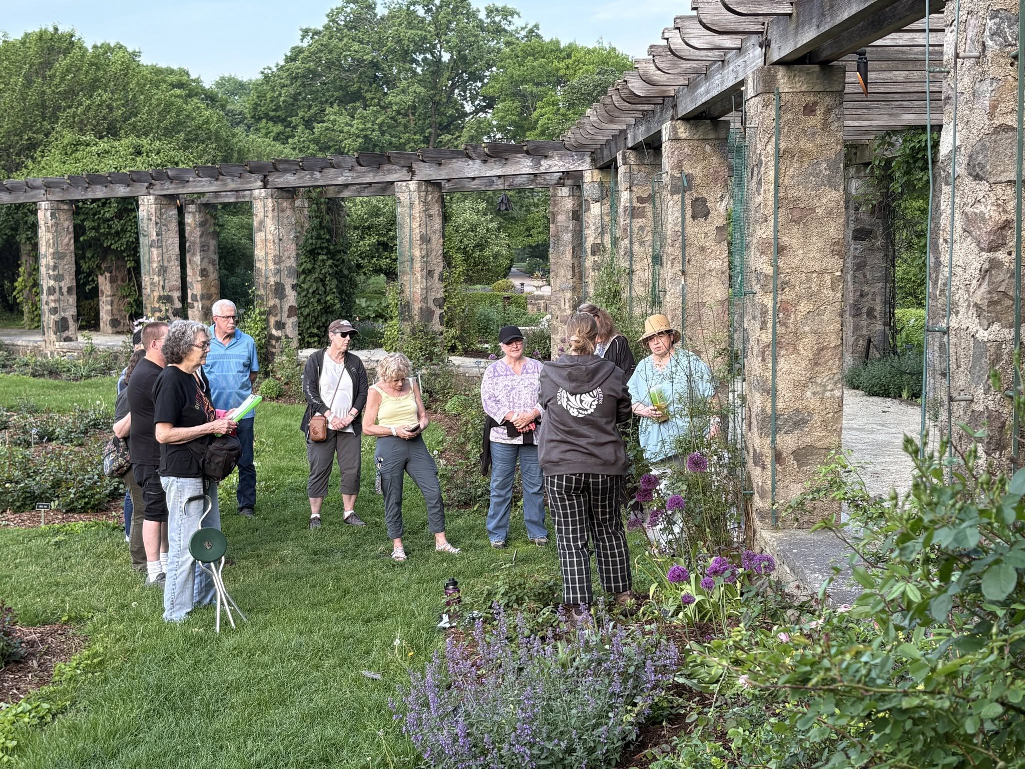 A group of people on a garden walk at Boerner Botanical Gardens