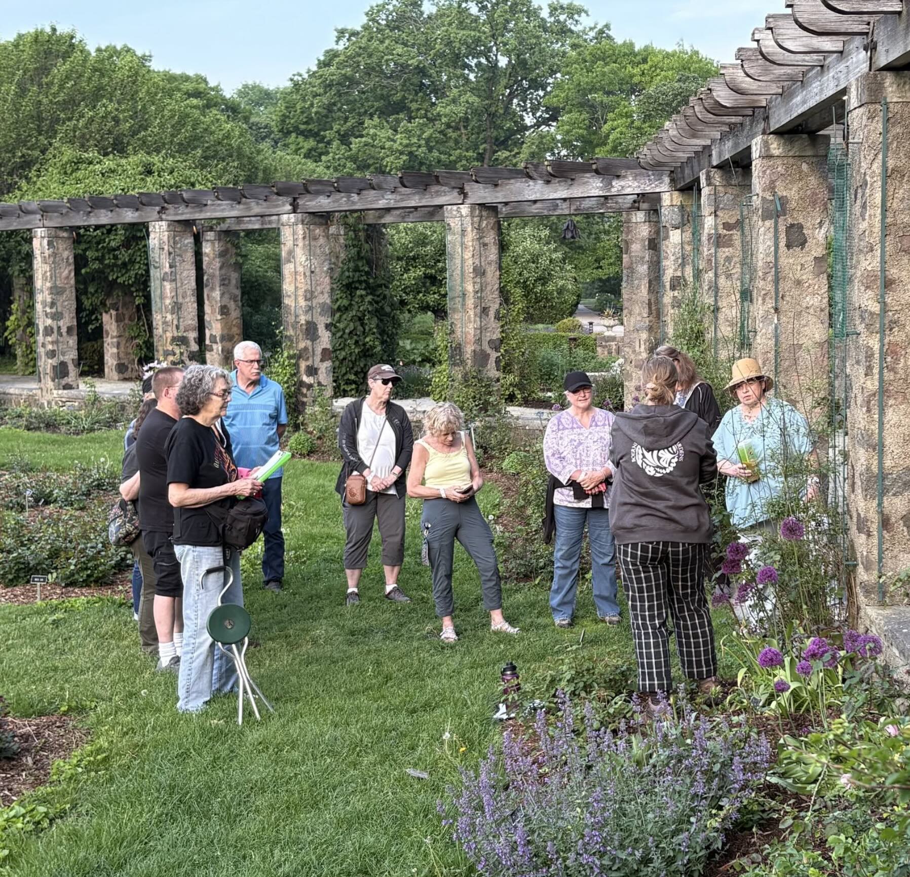 A group of people on a garden walk at Boerner Botanical Gardens