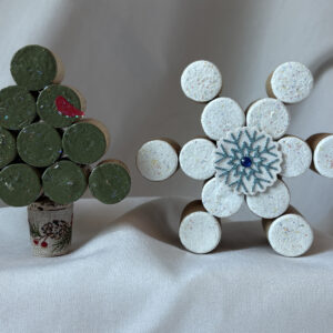 Two cork ornaments.