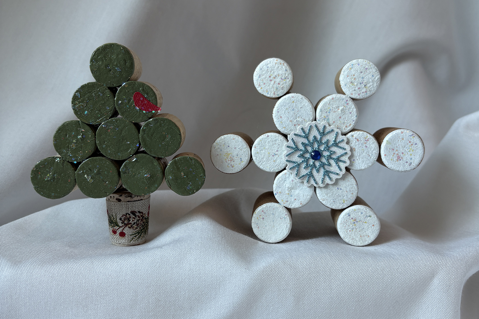 Two cork ornaments.